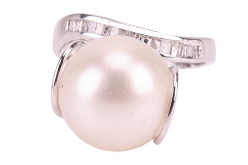 Lot 114 - A cultured pearl and diamond dress ring,...