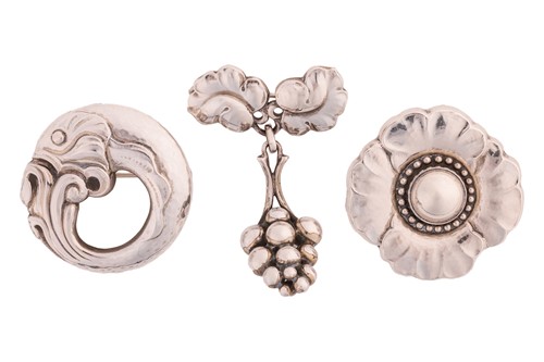 Lot 246 - Georg Jensen – a collection of three brooches;...