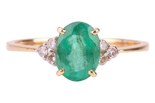 Lot 6 - An emerald and diamond dress ring, centred...