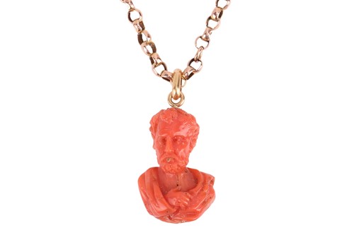 Lot 212 - A Grand Tour carved coral pendant on chain,...