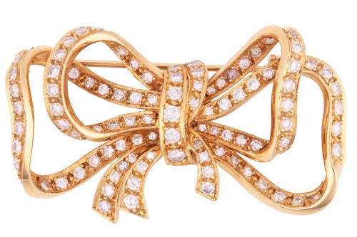 Lot 45 - A diamond-set brooch of stylised bow design,...