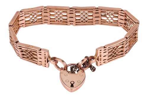 Lot 172 - A gate link bracelet, consisting of ten panel...
