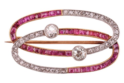 Lot 93 - An Art Deco ruby and diamond brooch, featuring...