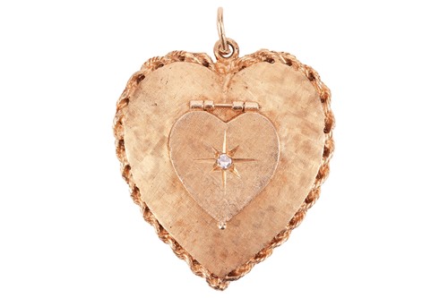 Lot 202 - A diamond-set heart locket pendant, comprising...