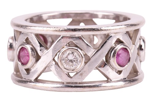 Lot 100 - A ruby and diamond-set ring, the 10.2mm band...