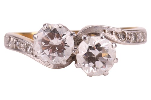 Lot 222 - A diamond Toi et Moi ring, featuring two round...