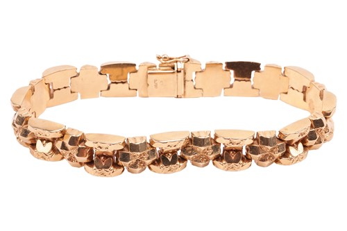 Lot 148 - A fancy link bracelet, comprising a series of...