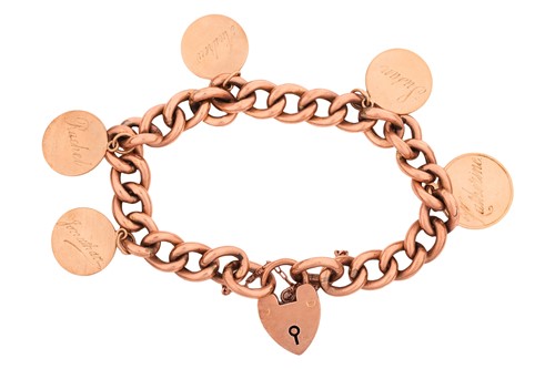 Lot 225 - A charm bracelet, comprising a chain of hollow...