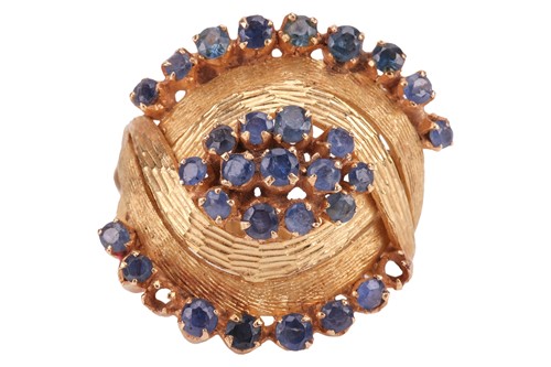 Lot 94 - A sapphire-set dress ring, composed of a...