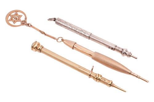 Lot 248 - Three telescopic propelling pencils; to...