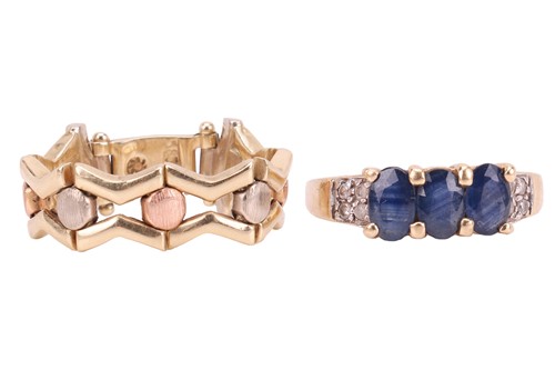 Lot 28 - Two dress rings; the first is a flexible fancy...