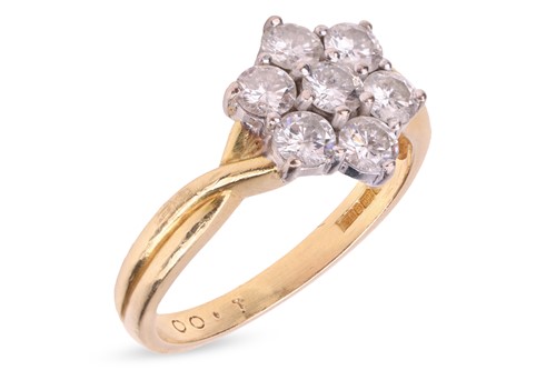 Lot 6 - A diamond flowerhead cluster ring in 18ct gold,...