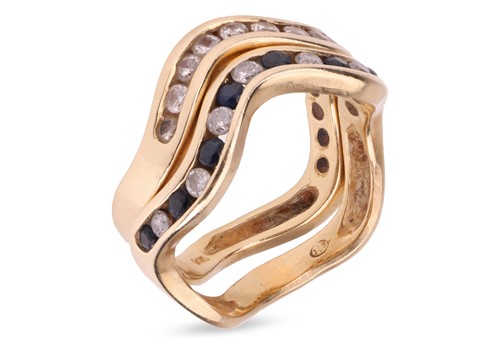 Lot 92 - Two stacking half-eternity rings, of sinuous...