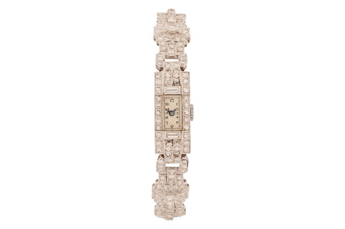 Lot 384 - A lady’s diamond-set cocktail watch, featuring...