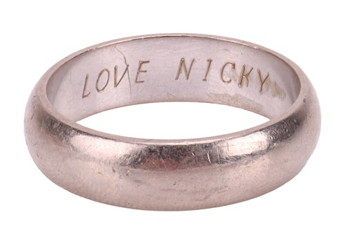 Lot 153 - A wedding band in 18ct white gold, the...