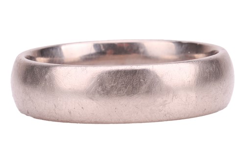 Lot 172 - A wedding band in 18ct white gold, comprising...