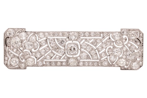 Lot 251 - An Art Deco diamond panel brooch of Japonisme...