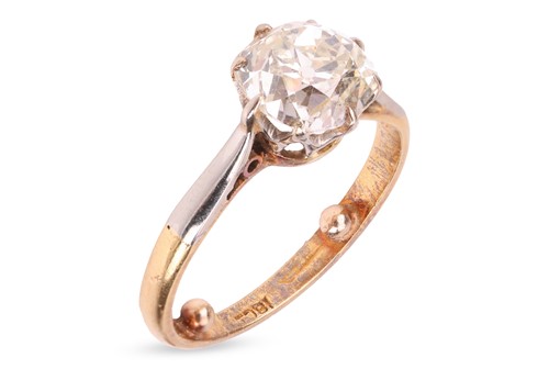 Lot 250 - An old-cut diamond solitaire ring, with an...