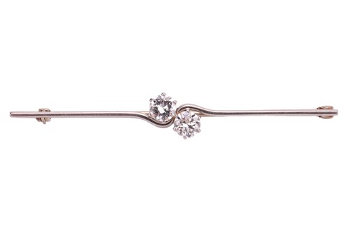 Lot 171 - An Art Deco two-stone diamond bar brooch, of...