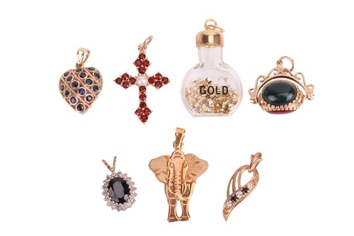 Lot 77 - A group of pendants, to include a hardstone...
