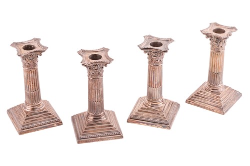Lot 457 - A set of four loaded silver Corinthian column...