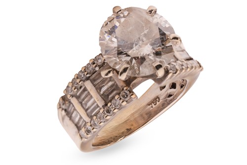 Lot 242 - A diamond solitaire ring, comprising a round...