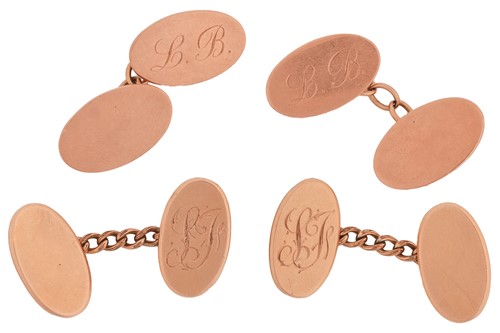 Lot 34 - Two pairs of cufflinks in 9ct gold; both...