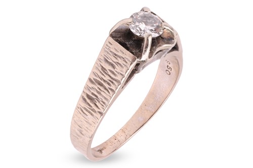 Lot 132 - A diamond solitaire ring, claw-set with a...