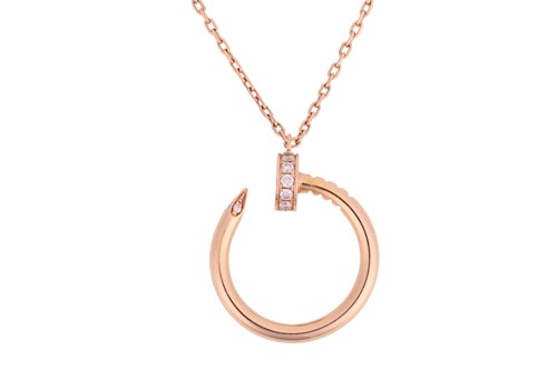 Lot 55 - Cartier - a 'Juste un Clou' pendant on chain,...