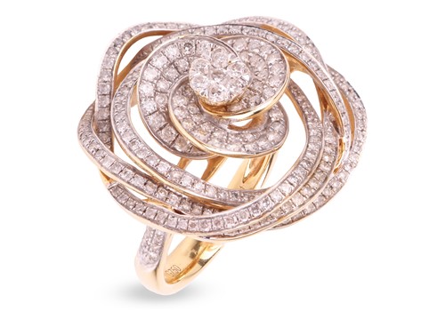 Lot 47 - A diamond-set twizzle ring in the form of a...