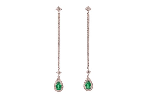 Lot 201 - A pair of emerald and diamond drop earrings in...