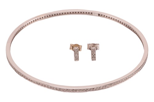 Lot 19 - A diamond-set bangle and matching stud...