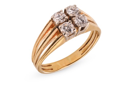 Lot 150 - A four-stone diamond cluster ring; featuring...
