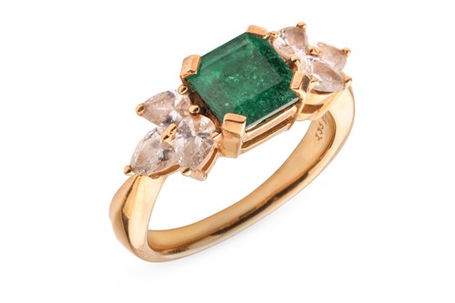 Lot 94 - An emerald and diamond dress ring, claw-set to...