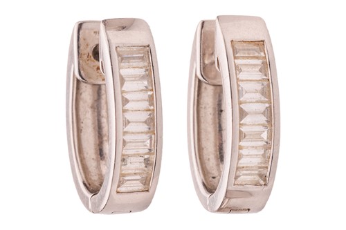Lot 208 - A pair of diamond-set huggies earrings, each...