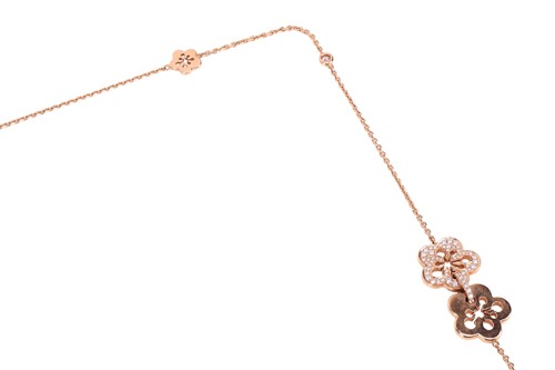 Lot 99 - Boodles - a diamond-set "Blossom" opera-length...