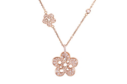 Lot 97 - Boodles - a diamond-set "Blossom" pendant on...