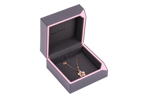 Lot 97 - Boodles - a diamond-set "Blossom" pendant on...