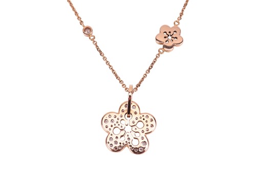 Lot 97 - Boodles - a diamond-set "Blossom" pendant on...