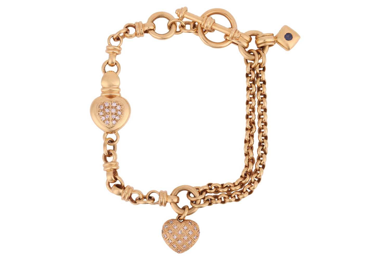 Lot 104 - A diamond-set heart charm bracelet in 18ct...