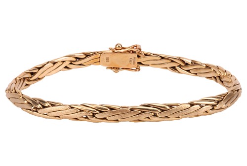 Lot 174 - A fancy braided wheat chain in 14ct yellow...
