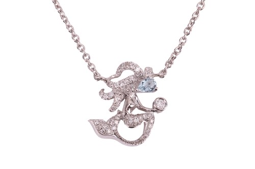 Lot 41 - A modern pale-blue topaz and diamond necklace...