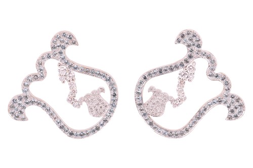 Lot 44 - A pair of modern pale-blue topaz and diamond...