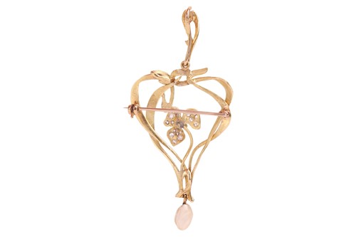 Lot An Art Nouveau iris pendant brooch, the flower...
