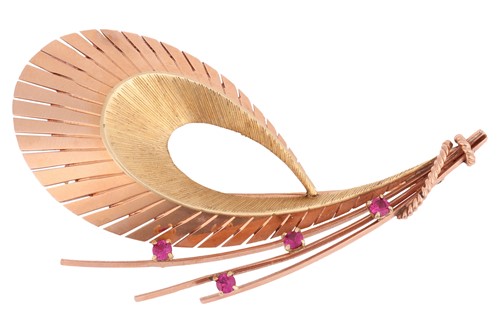 Lot 235 - A two-toned brooch in the form of a stylised...