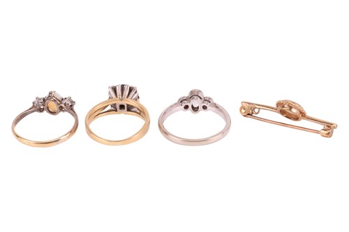 Lot 170 - Three rings and a bar brooch, comprising; An...