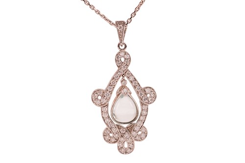 Lot 319 - An aquamarine and diamond-set pendant,...