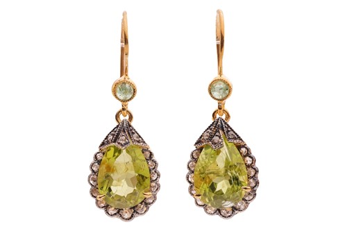 Lot 237 - A pair of gem-set drop earrings, each set with...