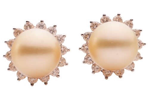 Lot 302 - A pair of cultured pearl stud earrings; each...