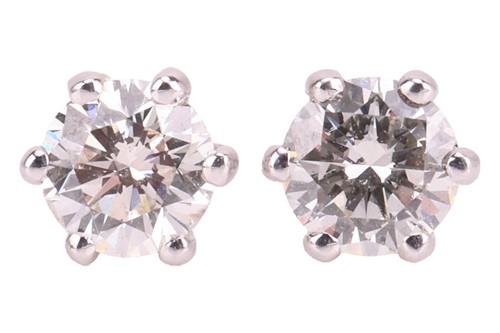 Lot 291 - A pair of diamond stud earrings, each...
